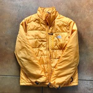 Yellow/orange north face puff coat